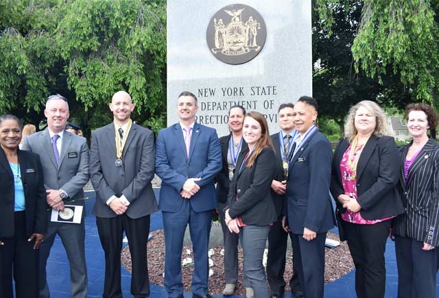 DOCCS honors parole officers at memorial wall; presents medals to PEF members at ceremony