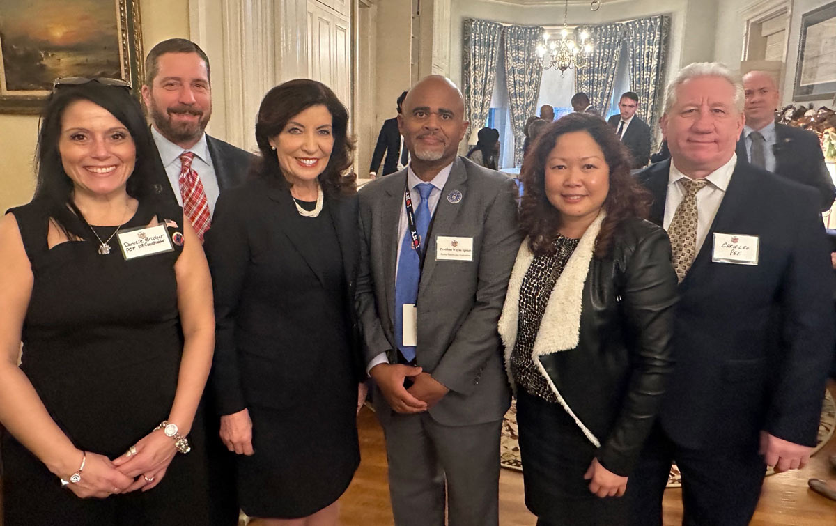 Team PEF with Governor Kathy Hochul at the State of the State address -- L to R i o: R8 Coordinator Danielle Bridger, Legislative Dir. Patrick Lyons, Gov. Hochul, President Spence, PEF Political Dir. Leah Gonzalez, Chief of Staff Chris Leo.