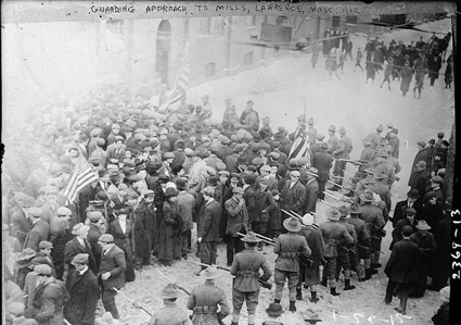 Photo shows the Lawrence textile strike of 1912, also known as the "Bread and Roses" strike.