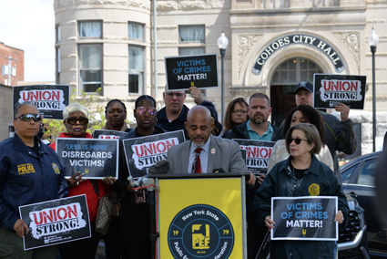 PEF President Wayne Spence was joined by a dozen parole officers outside the city court in Cohoes, N.Y., on May 4, 2023.