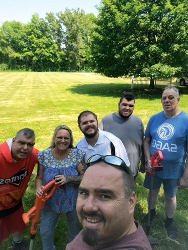 Preserving the past for those who no longer have a voice, from left to right, Poncho, Mike, Austin and Ed helped clean up the cemetery.