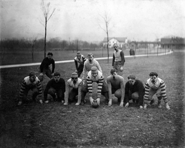 Football team of the Craig Colony for Epileptics, 1909. The players wear distinctive nose guards. The Craig Colony, located in Sonyea, Livingston County, opened in 1896. (New York State Archives, Craig Developmental Center (N.Y.).)