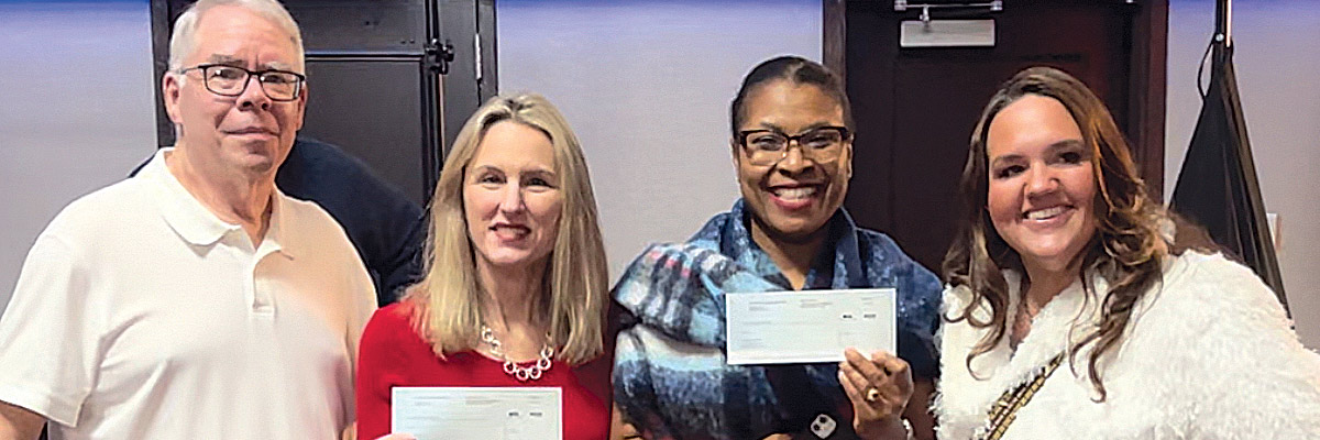 From left, PEF Region 12 Coordinator Bill Holthausen, 2023 PEF Convention nursing scholarship winners Lauren Gross, State Insurance Fund, and Joane Phanord, Pilgrim Psychiatric Center, and PEF Statewide Nurses Committee Chair Amy Lee Pacholk. Absent from picture is scholarship winner Jared Majeed, SUNY Stony Brook. 