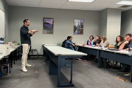 PEF Health & Safety Specialist Josh Kemp addresses PEF members at the Tax & Finance Department in Rochester on Nov. 13, 2024.