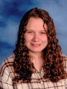 Photo of young woman smiling.