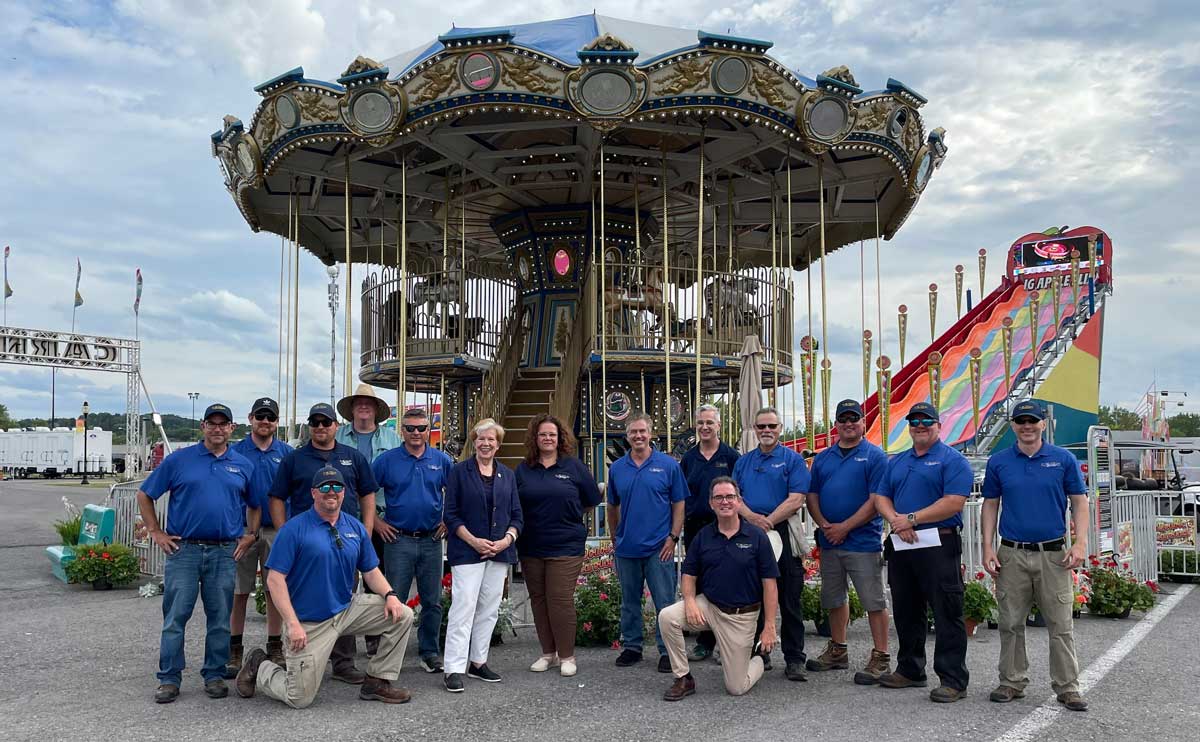 Credit: New York State Department of Labor.  Leonard and Reardon are joined by other ride inspectors and DOL Worker Protection employees at the State Fair. 