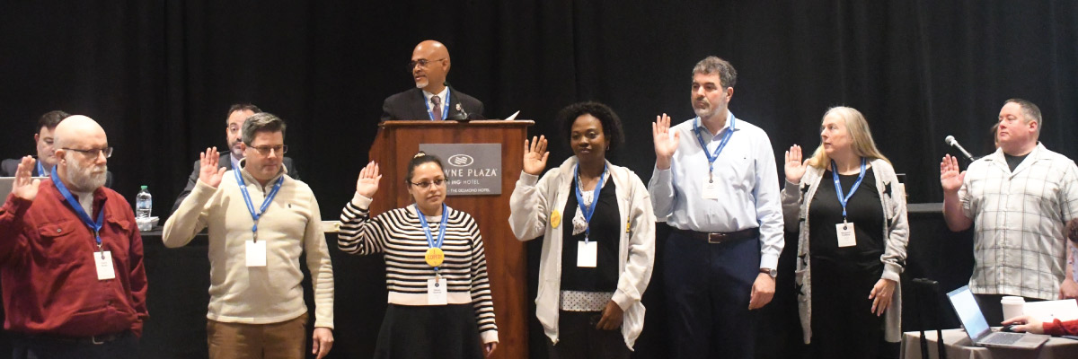 Eboard members being sworn in during the March 2026 Executive Board meeting
